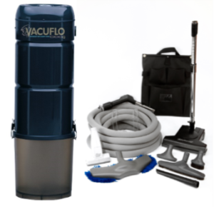 Vacuflo central vacuum power unit with hose, accessories, and storage bag.